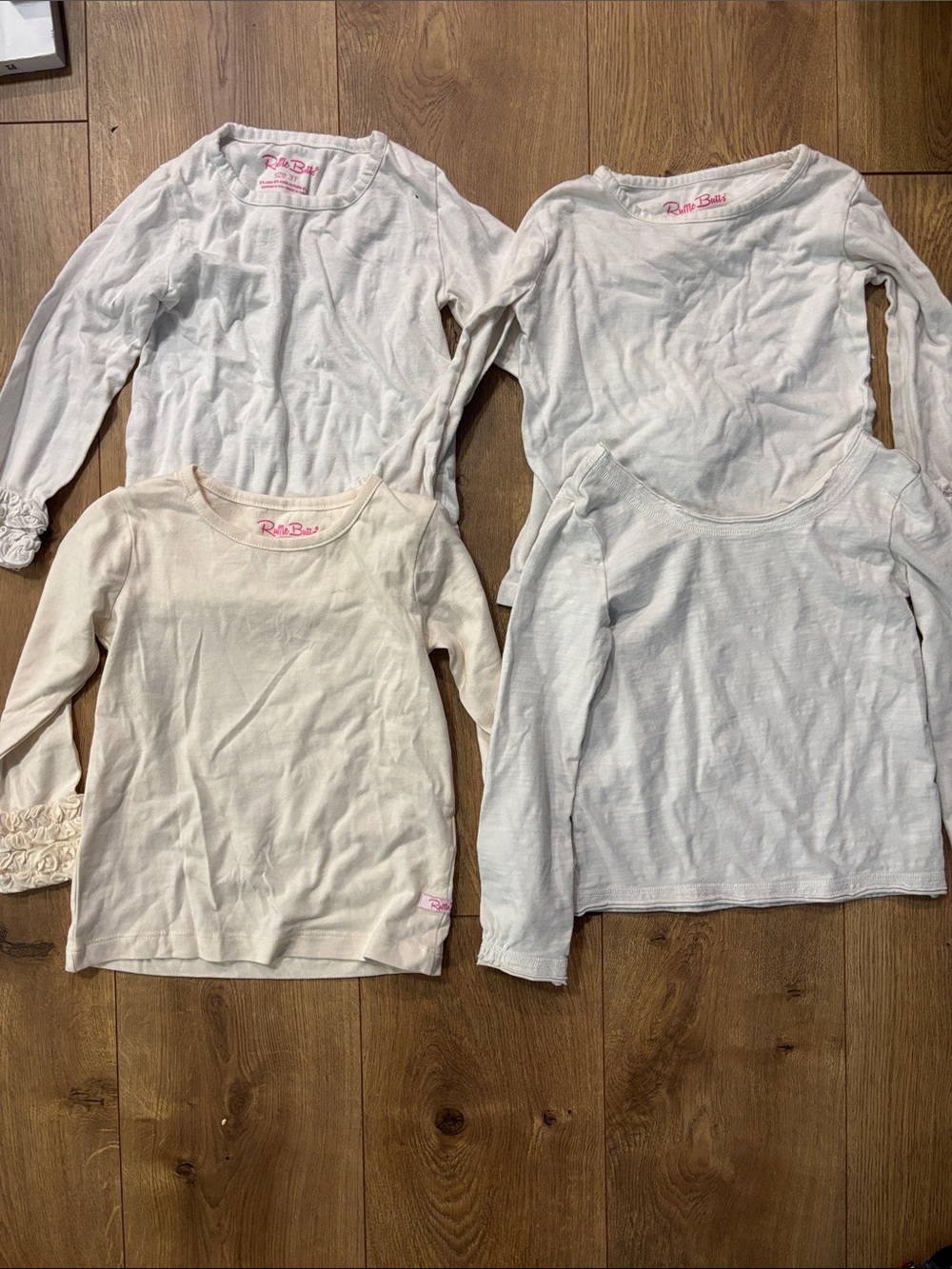 Ruffle Butts Girls' Long-Sleeve Tees in White & Cream - Pack of 4